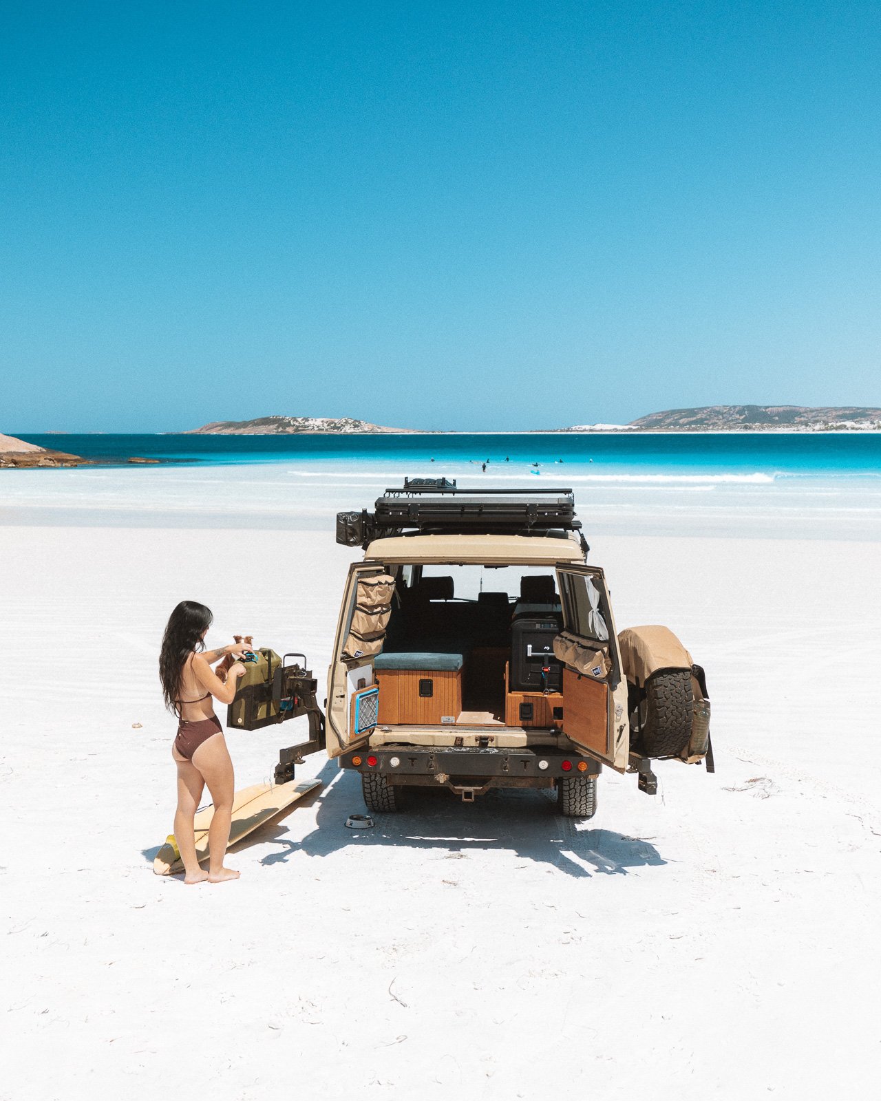 4WD parked on the white sand at Wharton Beach in Esperance