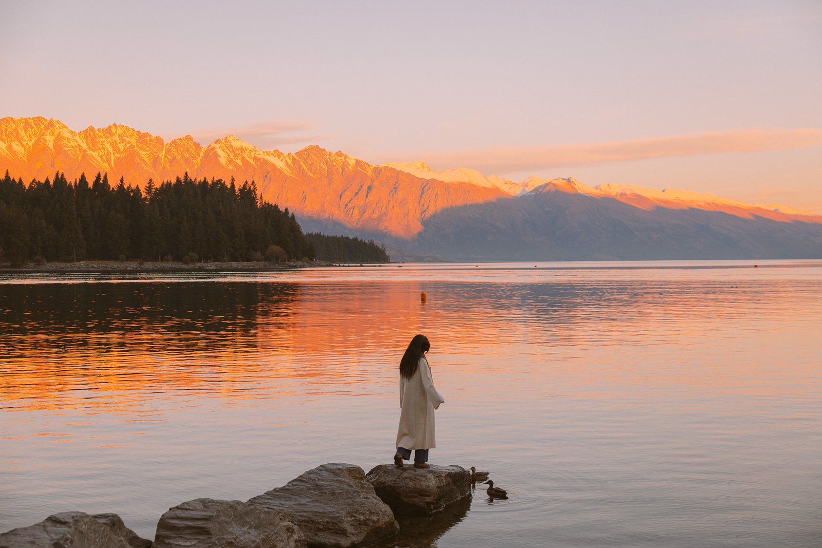 Queenstown in winter overlooking Lake Wakatipu and snowy mountains